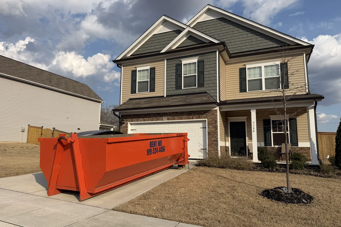 Waste On Wheels roll-off dumpster on a job in Wilson, Wilson County, NC