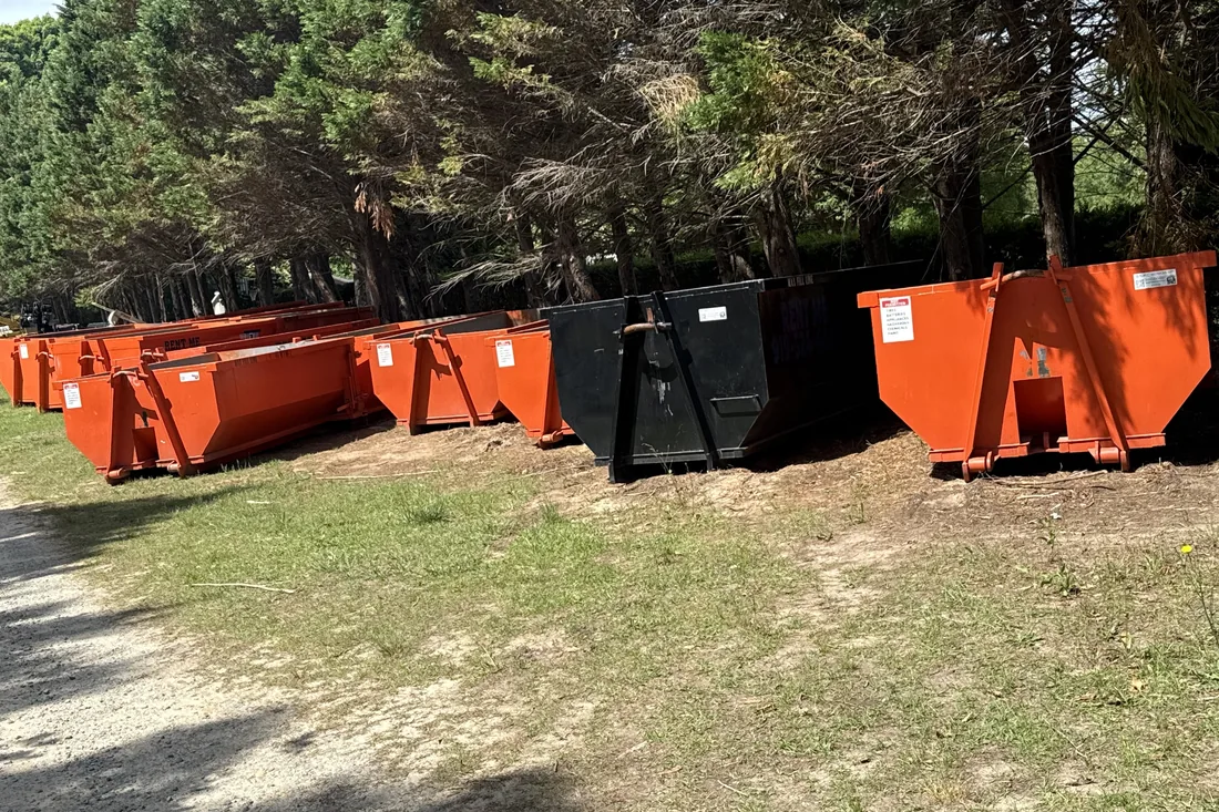 Waste On Wheels roll-off dumpster on a job in Benson, Johnston County, NC
