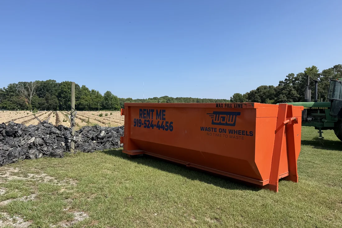 Waste On Wheels roll-off dumpster on a job in Willow Spring, Johnston County, NC