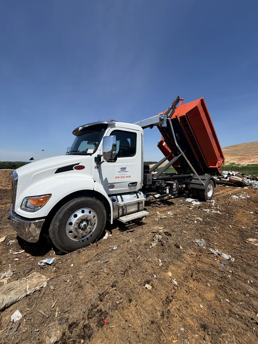 Waste On Wheels roll-off dumpster on a job in Holly Springs, Wake County, NC