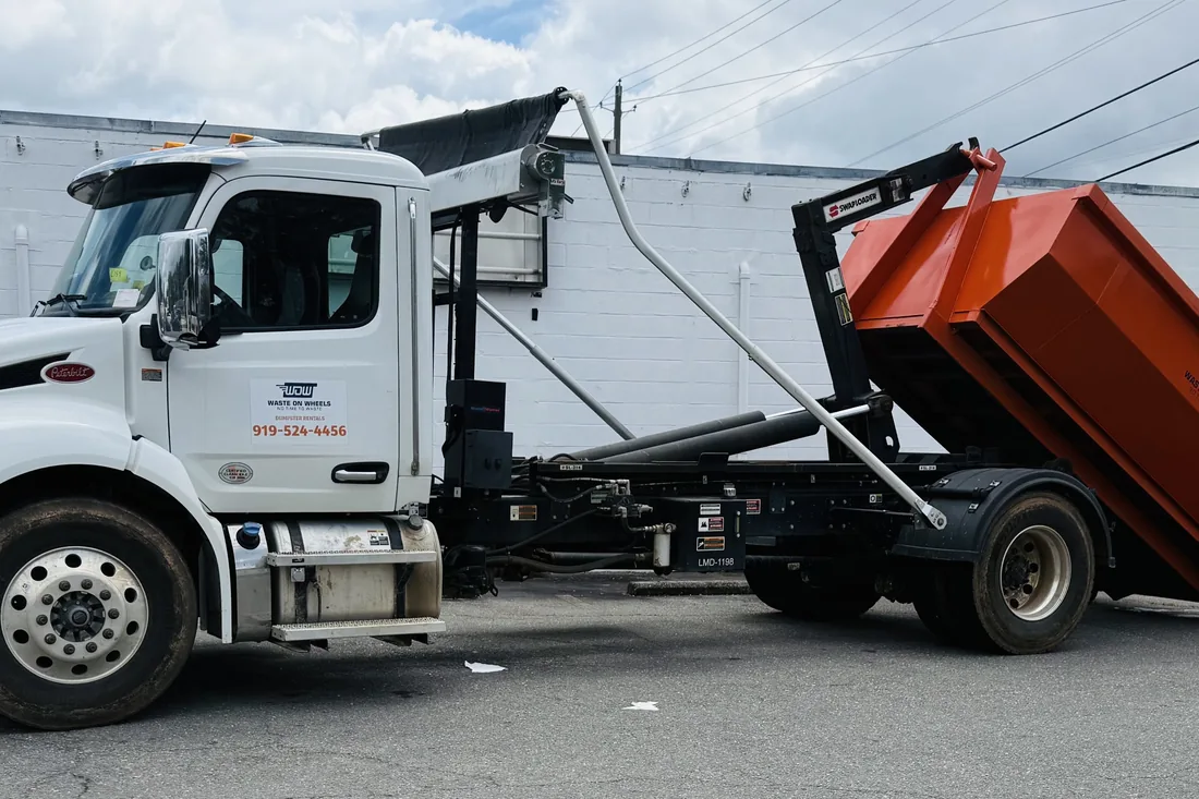 Waste On Wheels roll-off dumpster on a job in Apex, Wake County, NC